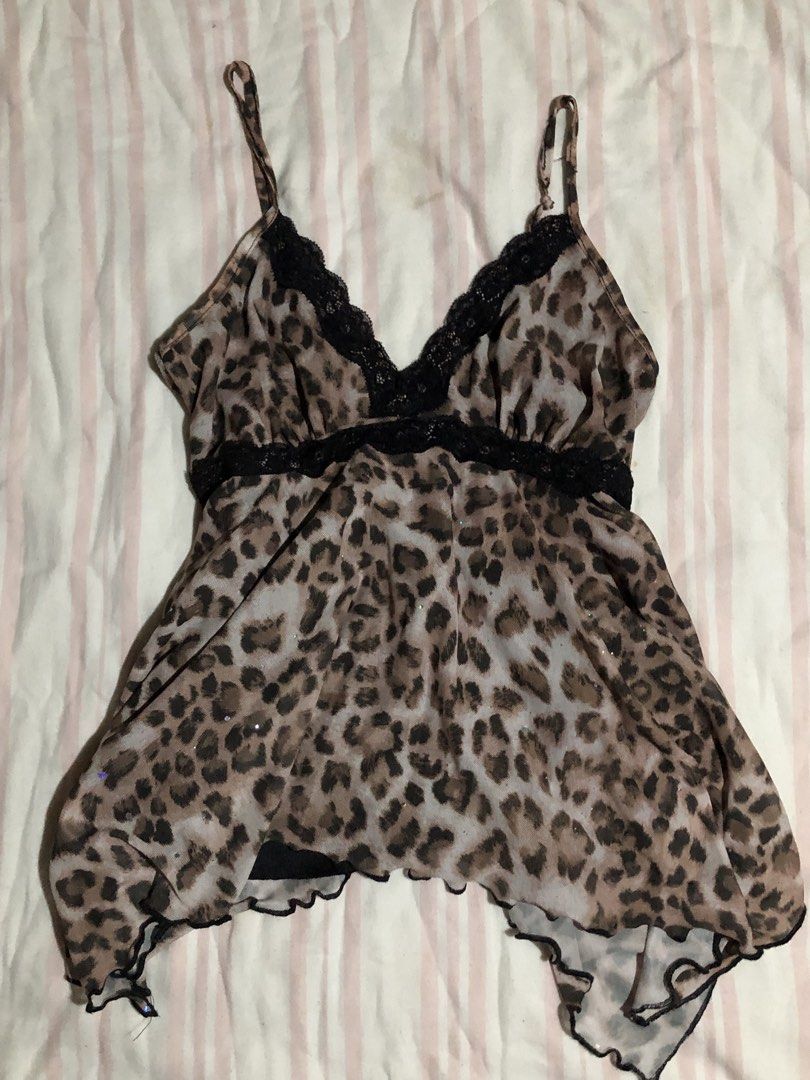 leopard sparkle cami (Category: Clothes Drying Rack) located in Manila. Submitted by sawako_finds (Listing ID 1468901497, Image 1). Description: 🐆 leopard sparkle cami size: s-m condition: no flaw ✨ wild little fairy magic in spots 🐆🤎.