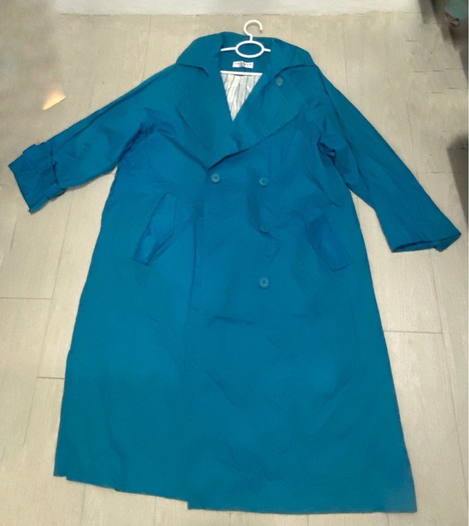 LE-SHERO Bright Blue Double Breasted Trench Coat (Category: Coats, Jackets and Outerwear) located in Manila. Submitted by abbyyey (Listing ID 1468773239, Image 3). Description: - Brand: Le-Shero - Color: Bright blue - Style: Double-breasted trench coat with lapel collar and front buttons - Features: Deep side pockets, long sleeves with cuff strap details - Lining: White fabric with thin grey vertical stripes - Fit: Roomy enough for layering over 