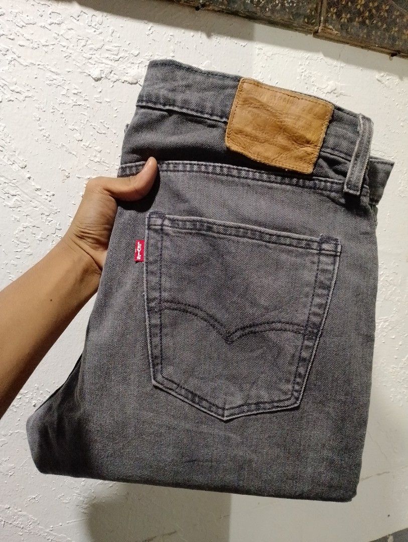 Levi's Grey Jeans (Category: Jeans) located in San Ildefonso. Submitted by lanz_baesa (Listing ID 1468883085, Image 1). Description: - Brand: Levi's - Color/Wash: Grey washed denim with natural fading - Closure: Classic button fly - Design: Traditional five-pocket styling - Details: Iconic rear leather patch and red tab - Condition/Use: Sturdy material, ideal for everyday wear.