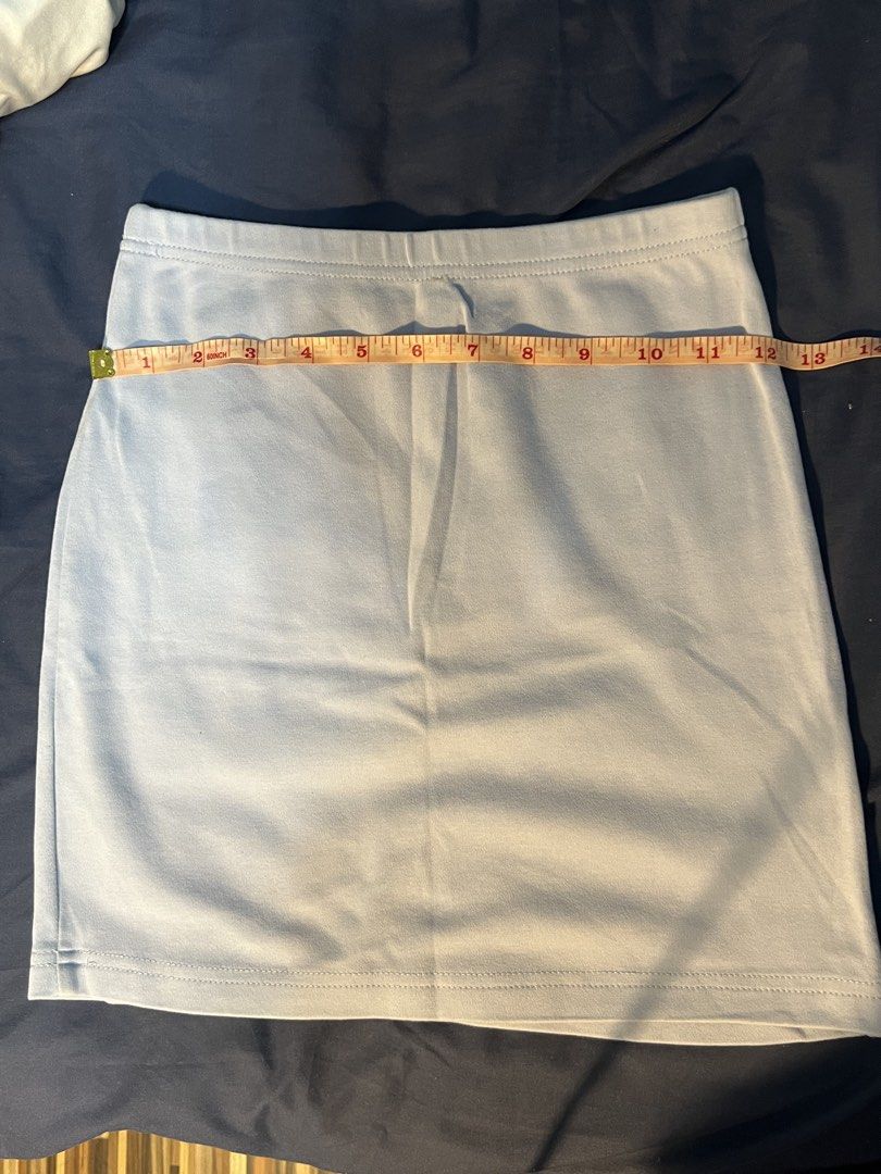 Light Blue Mini Pencil Skirt (Category: Skirts) located in Marikina City. Submitted by yssacee (Listing ID 1468915479, Image 2). Description: - Color: Light blue (color varies due to lighting) - Design: Simple solid style, easy to match with any top - Condition: Clean fabric with neat hem stitching - Style: Perfect casual everyday basic piece - rfs: does not fit me anymore - shipping from lower antipolo rizal - pm for more photos .