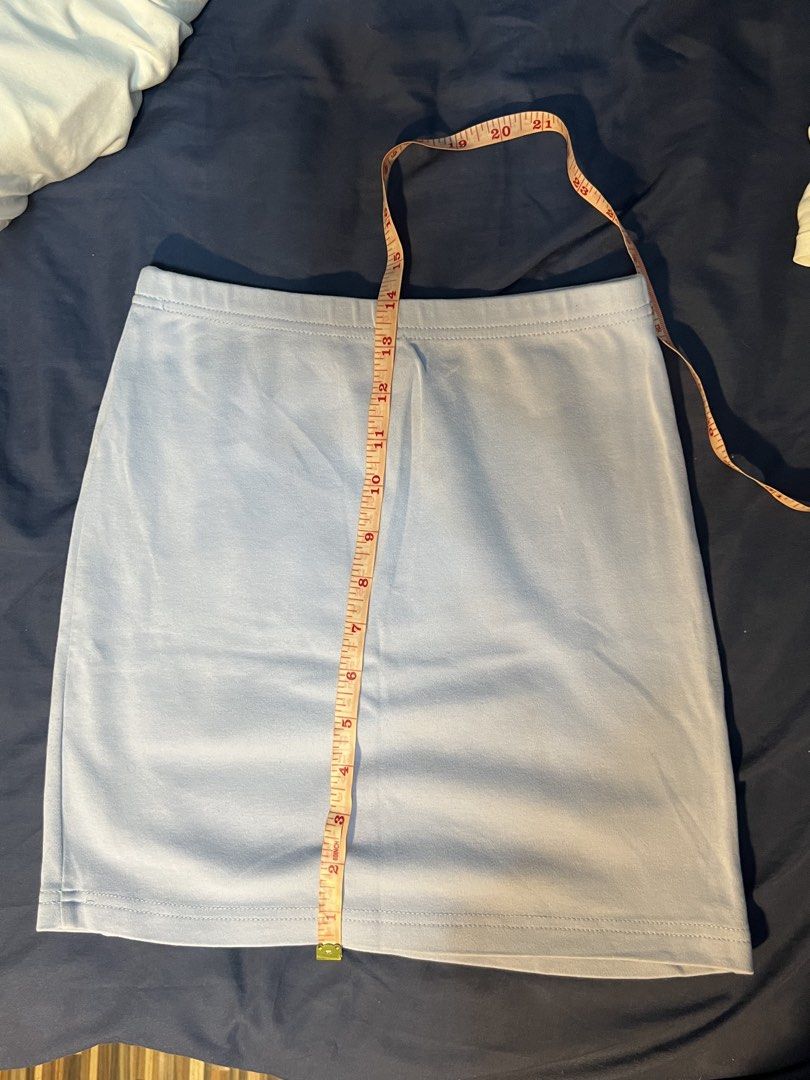 Light Blue Mini Pencil Skirt (Category: Skirts) located in Marikina City. Submitted by yssacee (Listing ID 1468915479, Image 1). Description: - Color: Light blue (color varies due to lighting) - Design: Simple solid style, easy to match with any top - Condition: Clean fabric with neat hem stitching - Style: Perfect casual everyday basic piece - rfs: does not fit me anymore - shipping from lower antipolo rizal - pm for more photos .