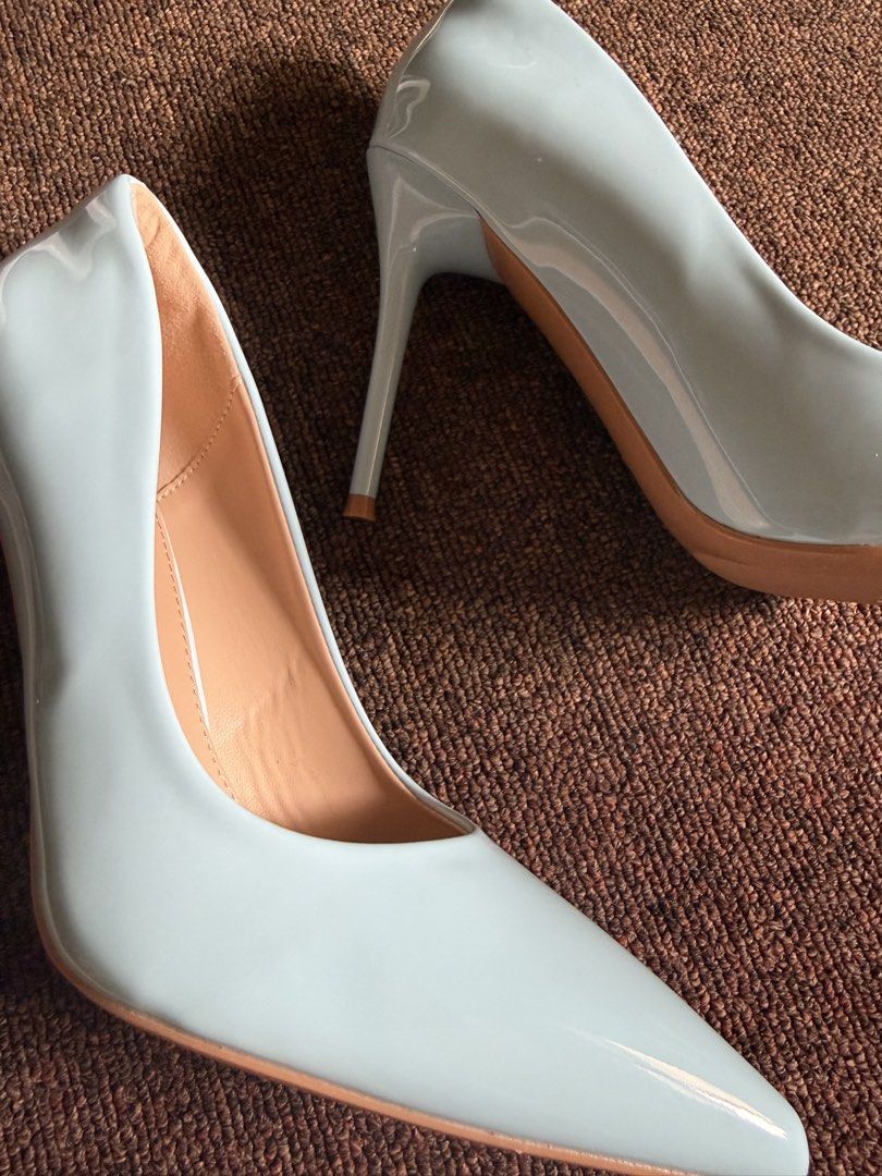 Light Blue Patent Pointed Toe Stiletto Heels Size 38 (Category: Heels) located in Cagayan de Oro. Submitted by redbluerider (Listing ID 1468779159, Image 2). Description: - Style: Pointed toe stiletto high heels - Color: Light blue patent with glossy finish (tan inner lining and sole) - Size: 38 - Condition: Excellent, closet clear-out piece ready for a new owner Price is negotiable.