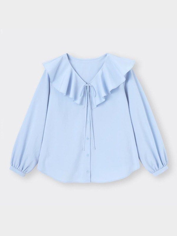 GU Light blue ruffle collar long sleeve button-up blouse (Category: Blouses) located in Binan City. Submitted by hannahbanana928 (Listing ID 1468713123, Image 1). Description: - Color: Light blue - Material: Soft, comfortable cotton - Design: Wide ruffled collar with front tie detail - Closure: Button-up front with matching blue buttons - Sleeves: Gathered cuffs - Versatility: Easy to pair with both skirts and pants for work or casual outings.