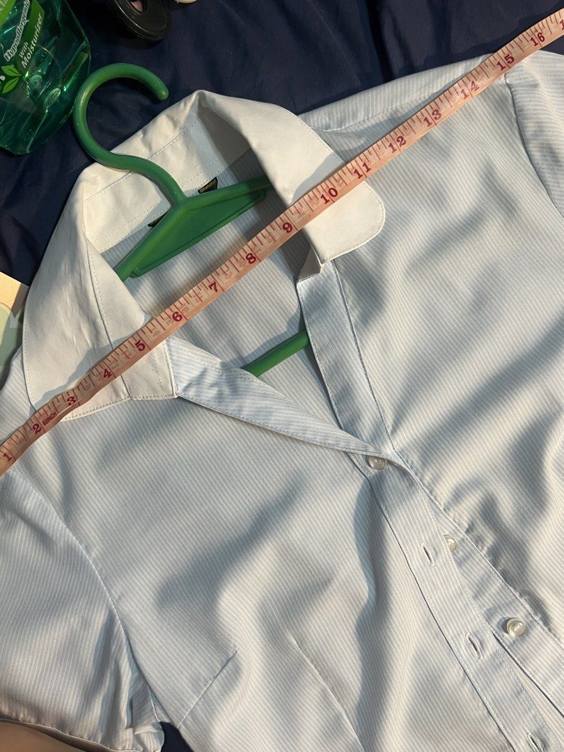 Light Blue White Striped Collared Short Sleeve Blouse (Category: Blouses) located in Marikina City. Submitted by yssacee (Listing ID 1468899530, Image 2). Description: - Light blue and white striped blouse. - Short sleeves with contrasting white cuffs and collar. Length measures around 27 inches. - great quality and feels nice to wear - Standard fit for everyday wear or casual office settings. -pm for more inquiries/photos - fits xs-s womens - RF