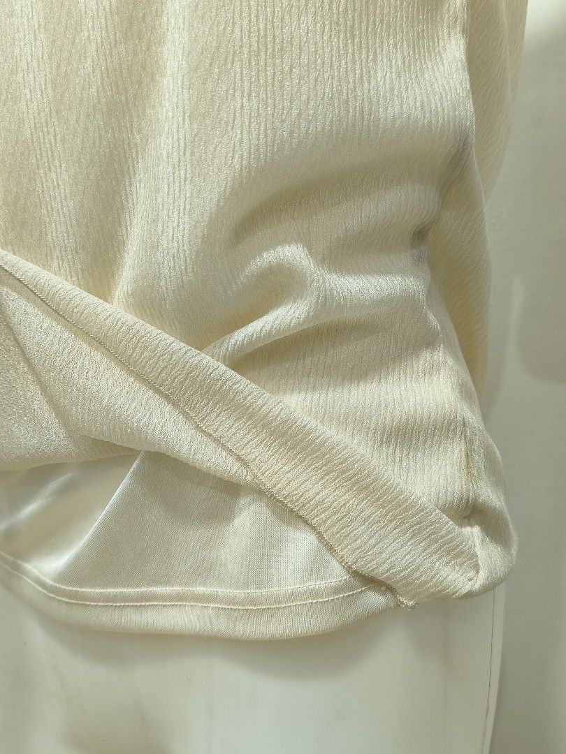 Light Champagne V-Cut Double Lining Blouse (Category: Blouses) located in Subic. Submitted by athelstlane (Listing ID 1468850572, Image 2). Description: - Lettuce Hem on the bottom of the blouse - Silk double-lining - Light-weight fabric.