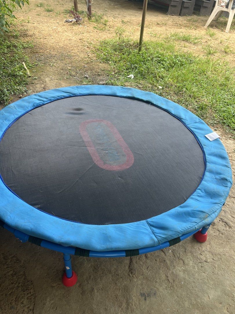 Little Tikes Junior Trampoline (Category: Infant Playtime) located in Manila. Submitted by mayumishanel (Listing ID 1468924793, Image 1). Description: - Authentic Little Tikes kids trampoline for indoor or outdoor play - Sturdy blue metal frame with red feet and safety padding - Black jumping mat featuring a fun red center target mark - Standard toddler size.