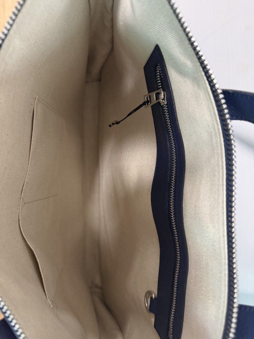 Loewe Porta Documentos Marine Briefcase (Category: Briefcases) located in Taguig. Submitted by riacalleja1 (Listing ID 1468756570, Image 2). Description: Vintage LOEWE Porta Documentos Marine / Briefcase – Navy Blue Leather ₱25,000| Slightly negotiable Selling my vintage Loewe Porta Documentos Marine business/document bag in beautiful navy blue leather. Purchased from NUIR Vintage in Shibuya, Tokyo, Japan. A minimalist, rectangular leather docume