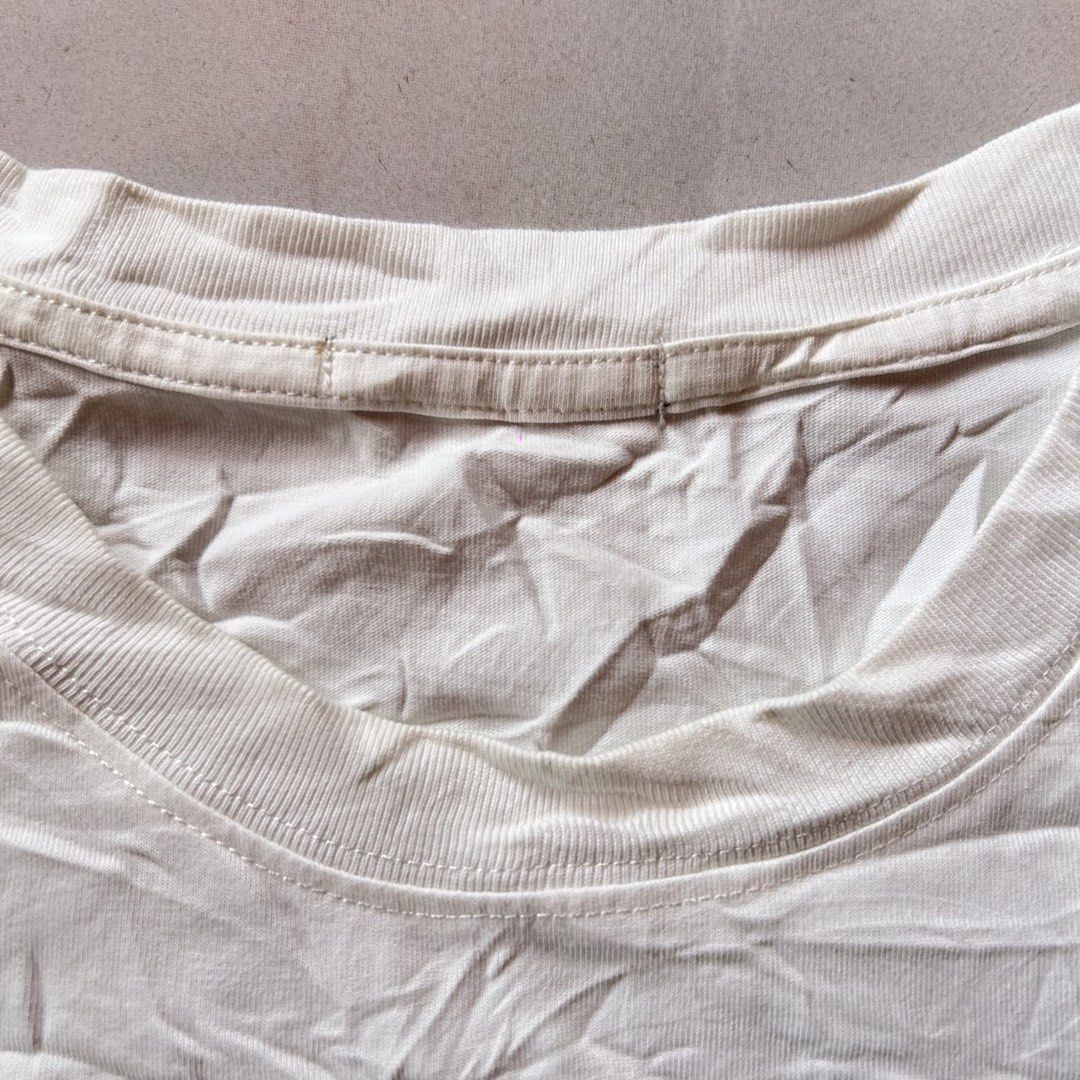 Loewe White pocket tee 🥰 (Category: Shirts) located in Jinoba-an. Submitted by eegiboy (Listing ID 1468743116, Image 3). Description: - Brand: Loewe - Color: White with dark brown chest pocket - Material: Soft 100% cotton - Size: L (Relaxed everyday fit) - Design: Crew neck, short sleeves, embroidered Anagram logo & playful plant creature graphic - Condition: Brand new / Excellent pre-loved (Ready to wear) - Mode of Payment: GCash, BPI, or Bank 