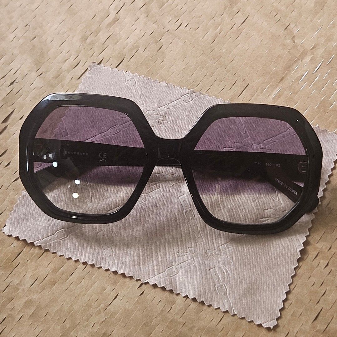 Longchamp Black Geometric Sunglasses (Category: Sunglasses & Eyewear) located in Imus. Submitted by a.niko (Listing ID 1468750034, Image 1). Description: - Brand: Longchamp - Frame: Black thick geometric frames - Origin: Made in China (measurements stamped on inner temple) - Condition: Sturdy hinges, well-maintained - Inclusions: cleaning cloth - Perfect for stylish everyday wear!.