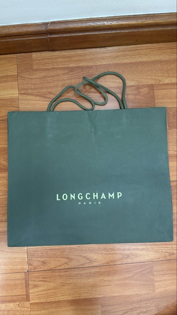 Longchamp Green Paper Shopping Bag (Category: Tote Bags) located in Quezon City. Submitted by _daynes (Listing ID 1468768732, Image 1). Description: Authentic longchamp paperbag A little crumpled due to storage.