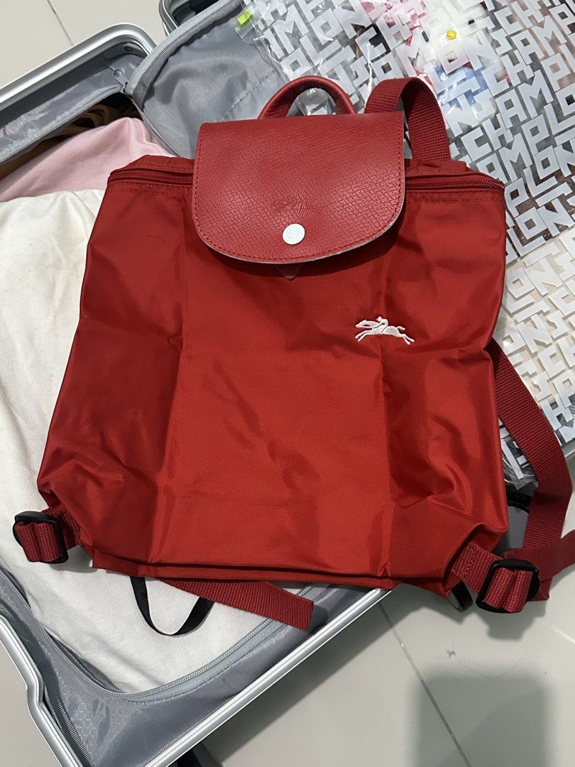 Longchamp Le Pliage Backpack in Red (Category: Backpacks) located in Manila. Submitted by callieg__ (Listing ID 1468817403, Image 2). Description: - looks brand new - used once - LP posted - ORIG bought from zalora longchamp - lalamove/lbc - gcash/bank transfer loc: manila.
