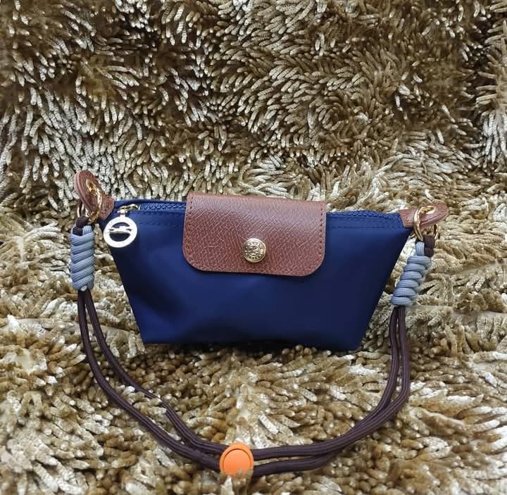 Longchamp Le Pliage Mini Pouch Bag with Strap Ke (Category: Shoulder Bags) located in Manila. Submitted by lecha201992 (Listing ID 1468882345, Image 2). Description: .