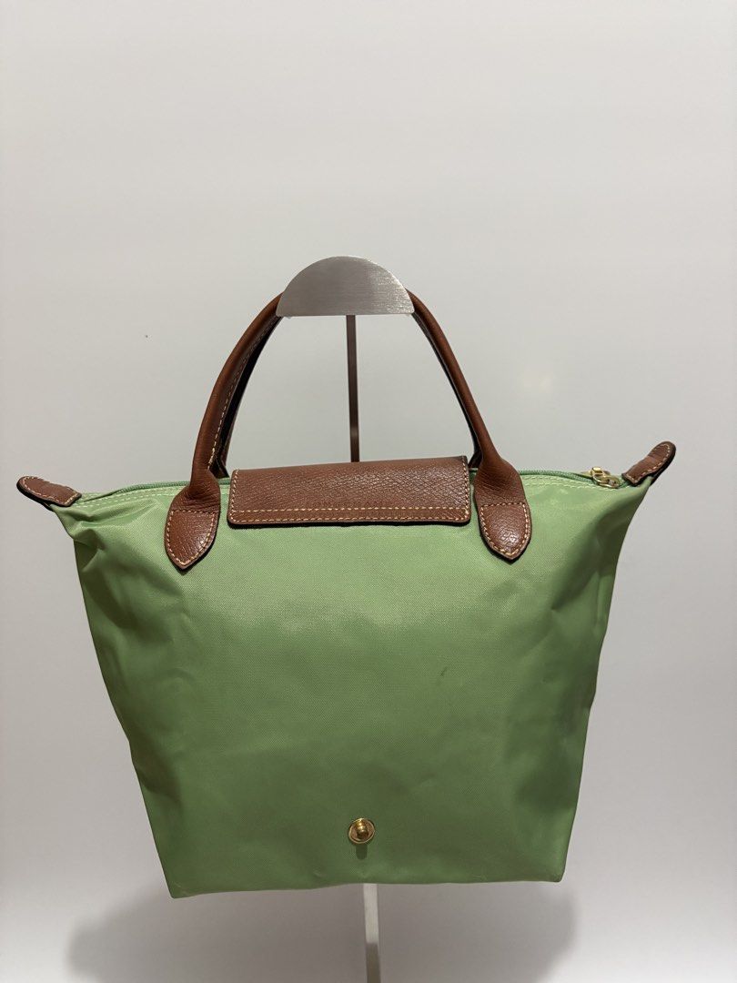 Authentic Longchamp Le Pliage Small Short Handle (Category: Luxury Bags & Wallets) located in Subic. Submitted by dear.jeveaph (Listing ID 1468757819, Image 2). Description: Authentic Longchamp Le Pliage Small Short Handle Minimal signs of use ₱ 1000.00 READ BEFORE BUYING ‼️ All photos are posted. Please perform your own authentication beforehand. If in DOUBT, please do NOT buy. ‼️ Friendly reminder: This is a preloved bag. Please manage your exp