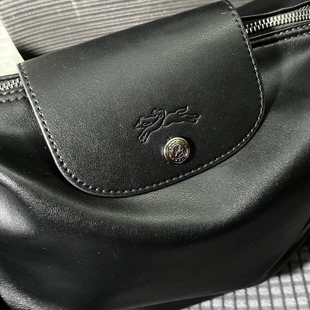 Black Longchamp Medium Le Pliage Adjustable Shoulder Bag (Category: Shoulder Bags) located in Manila. Submitted by fleurnarcotik (Listing ID 1468827219, Image 3). Description: Authentic see serial code Color & Material: Black Calf Leather Dimensions (Official Site): 12.4" (W) x 9.84" (H) x 4.33" (D) Shipping Preferred: Lalamove is highly recommended to preserve the bag's shape during transit. J&T Express is also available, but pouches have size l