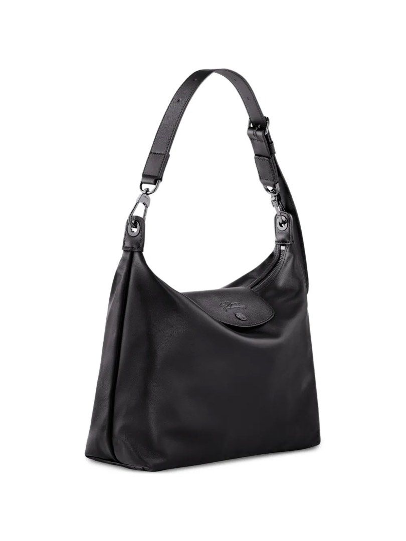Black Longchamp Medium Le Pliage Adjustable Shoulder Bag (Category: Shoulder Bags) located in Manila. Submitted by fleurnarcotik (Listing ID 1468827219, Image 1). Description: Authentic see serial code Color & Material: Black Calf Leather Dimensions (Official Site): 12.4" (W) x 9.84" (H) x 4.33" (D) Shipping Preferred: Lalamove is highly recommended to preserve the bag's shape during transit. J&T Express is also available, but pouches have size l