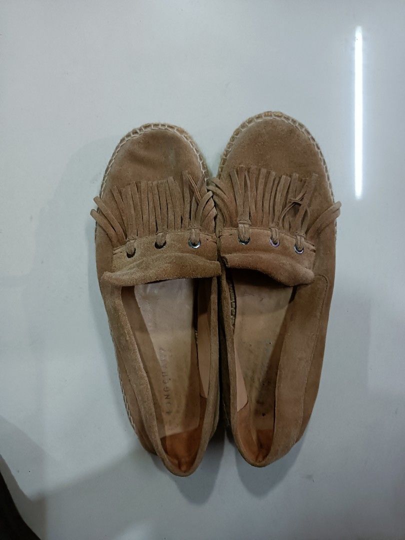 Longchamp Suede Fringe Espadrilles Size 41 Made In Spain (Category: Flats & Sandals) located in Manila. Submitted by pnjdianne25879 (Listing ID 1468838607, Image 1). Description: - Brand: Longchamp - Style: Slip-on espadrilles with fringe and eyelet details - Material: Brown suede upper with jute-wrapped midsole - Size: 41 (Made in Spain) - Condition: Soles and inner lining show visible signs of previous use; suede uppers have normal handling mar