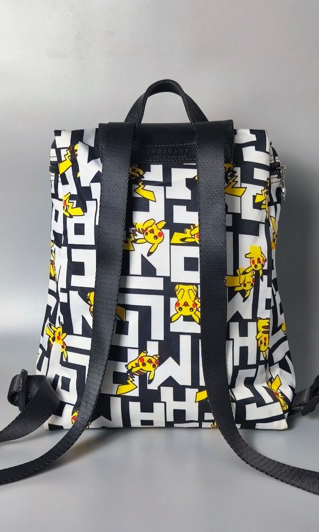 Longchamp x Pokemon Limited Backpack (Category: Luxury Bags & Wallets) located in Bulacan. Submitted by 4kcollection.ph (Listing ID 1468716855, Image 2). Description: Longchamp x Pokemon Limited Backpack (Rare) Pre-loved from Japan 🇯🇵 Very Good Condition Size: Medium H'12.5 x L'9.5 x W'4 Inches Ykk Zip Sign of use only (dirt & Stain Inside) No Rubs Dm for sure buyer 📩 MOP: Gcash / Maya / BPI Courier: J&t / Lbc / Lalamove Location: SJDM Bulacan