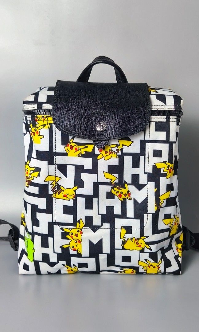 Longchamp x Pokemon Limited Backpack (Rare (Category: Luxury Bags & Wallets) located in Bulacan. Submitted by 4kcollection (Listing ID 1468717007, Image 1). Description: Longchamp x Pokemon Limited Backpack (Rare) Pre-loved from Japan 🇯🇵 Very Good Condition Size: Medium H'12.5 x L'9.5 x W'4 Inches Ykk Zip Sign of use only (dirt & Stain Inside) No Rubs Dm for sure buyer 📩 MOP: Gcash / Maya / BPI Courier: J&t / Lbc / Lalamove Location: SJDM Bula