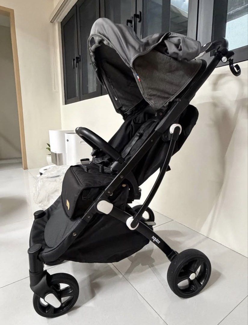 Looping Squizz Compact Stroller Grey Black (Category: Strollers) located in Quezon City. Submitted by mjkalaw (Listing ID 1468800847, Image 2). Description: - Model: Looping Squizz Stroller - Color: Black and Dark Grey - Design: Compact fold, ideal for travel and daily commutes - Safety: Secure 5-point harness with comfortable quilted padding and protective bumper bar - Comfort & Convenience: Adjustable canopy with mesh window and roomy under-sea
