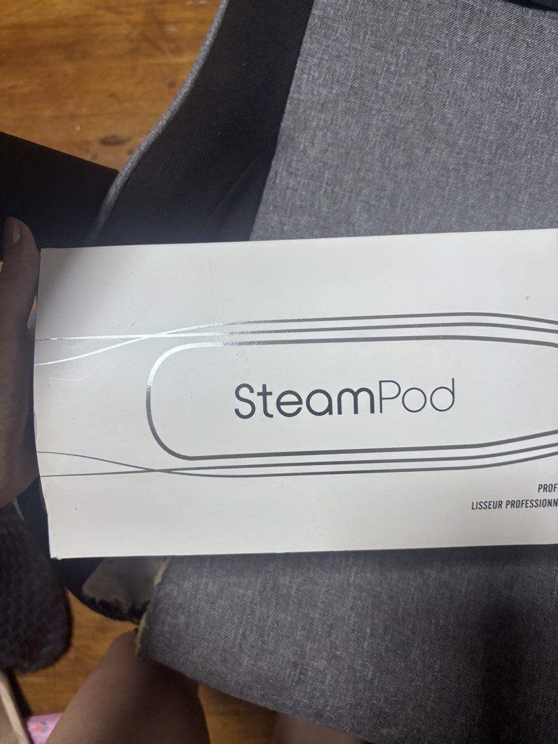 L'Oreal Professionnel SteamPod 3 Professional Styler (Category: Hair) located in Pasig City. Submitted by prettypink0420 (Listing ID 1468877928, Image 1). Description: - Authentic L'Oreal Professionnel x Rowenta Salon SteamPod - Advanced steam technology for instant hair transformation with 78% less damage - Sleek black and white design featuring an integrated water tank and 360-degree rotative cord - Intelligent heat control with multiple adjust