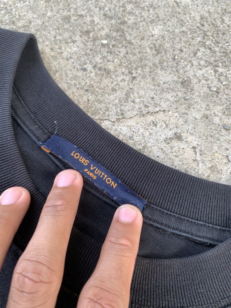 Louis Vuitton Beaded logo (Category: Tshirts & Polo Shirts ) located in Kalibo. Submitted by thriftyfinds09 (Listing ID 1468773495, Image 2). Description: Louis Vuitton Beaded logo Excellent condition Size L 24 width 29.5length Need wash issue:missing beads Color rate:9.5/10 📥📥📥.