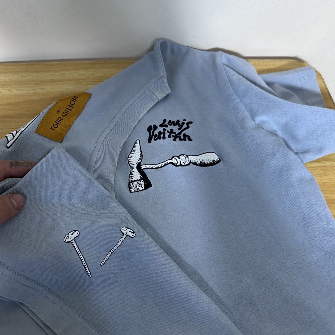 LOUIS VUITTON EMBROIDERED MULTI-TOOLS LIGHT BLUE TEE (Category: Tshirts & Polo Shirts ) located in Dipolog. Submitted by edthrfts (Listing ID 1468899028, Image 3). Description: ✅ ALREADY WASHED AND SANITIZED 📐Width: 21.5 📐Length: 26.5 Fit to: L-XL Condition: 9.5/10 Color: 9.2/10 Issue: white fades sa neckline pero unnoticeable naman parang design lang nya.