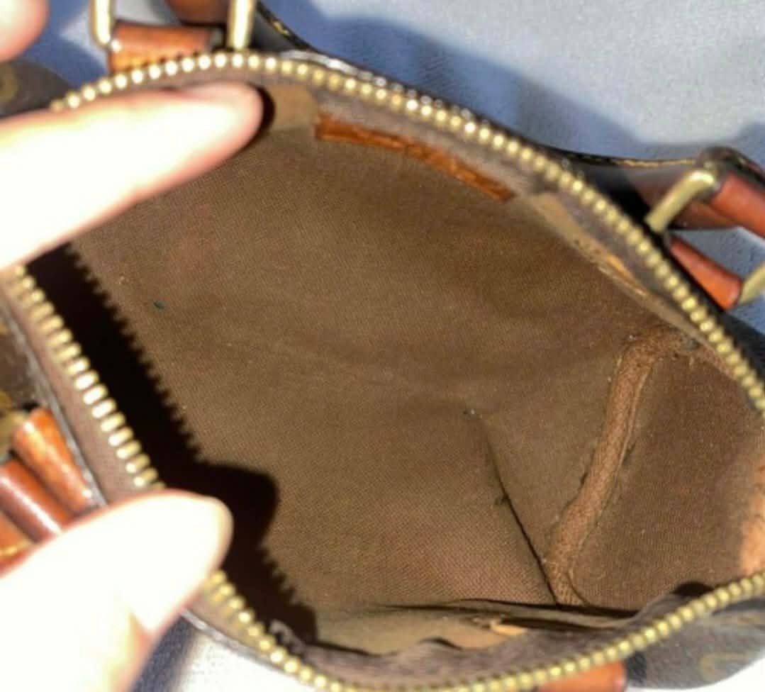 Louis Vuitton Mini Speedy (Category: Luxury Bags & Wallets) located in Manila. Submitted by preloved119 (Listing ID 1468817948, Image 3). Description: - Authentic Louis Vuitton monogram canvas barrel bag - Classic brown coated canvas with iconic LV pattern - Premium Vachetta leather handles and trim - Secure top zip closure - Brown textile interior lining - Interior tag: Louis Vuitton Paris Made in France - Compact cylindrical shape, perfect for 