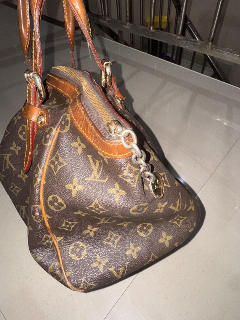 Louis Vuitton Monogram Canvas Handbag (Category: Luxury Bags & Wallets) located in Cebu City. Submitted by latendacebu (Listing ID 1468773440, Image 3). Description: - Authentic Louis Vuitton monogram canvas handbag - Features iconic brown leather trim and dual top handles - Secure zip top closure with elegant gold-tone hardware - Stylish buckle strap details on the front - Spacious interior compartment for daily essentials - Note: Leather shows 