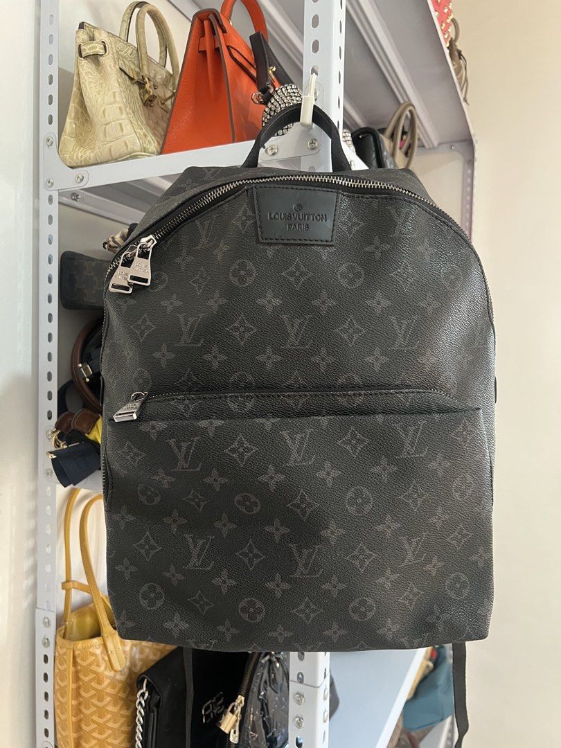 Louis Vuitton Monogram Eclipse Discovery Backpack (Category: Backpacks) located in Muntinlupa City. Submitted by armendaber03743 (Listing ID 1468768549, Image 1). Description: Monogram Eclipse canvas backpack, black leather trim. Silver-tone hardware engraved with Louis Vuitton. Front zipped pocket, roomy main compartment with interior pockets. Adjustable shoulder straps with metal sliders. Made in France..