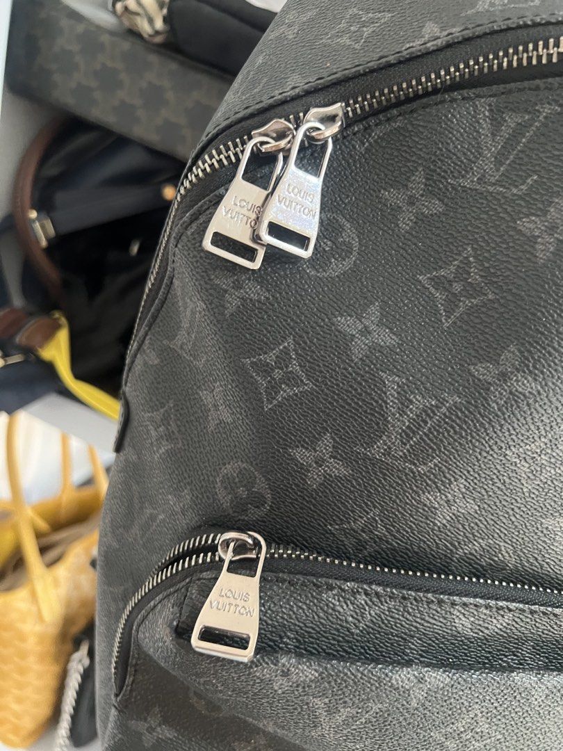 Louis Vuitton Monogram Eclipse Discovery Backpack (Category: Backpacks) located in Muntinlupa City. Submitted by armendaber03743 (Listing ID 1468768549, Image 2). Description: Monogram Eclipse canvas backpack, black leather trim. Silver-tone hardware engraved with Louis Vuitton. Front zipped pocket, roomy main compartment with interior pockets. Adjustable shoulder straps with metal sliders. Made in France..