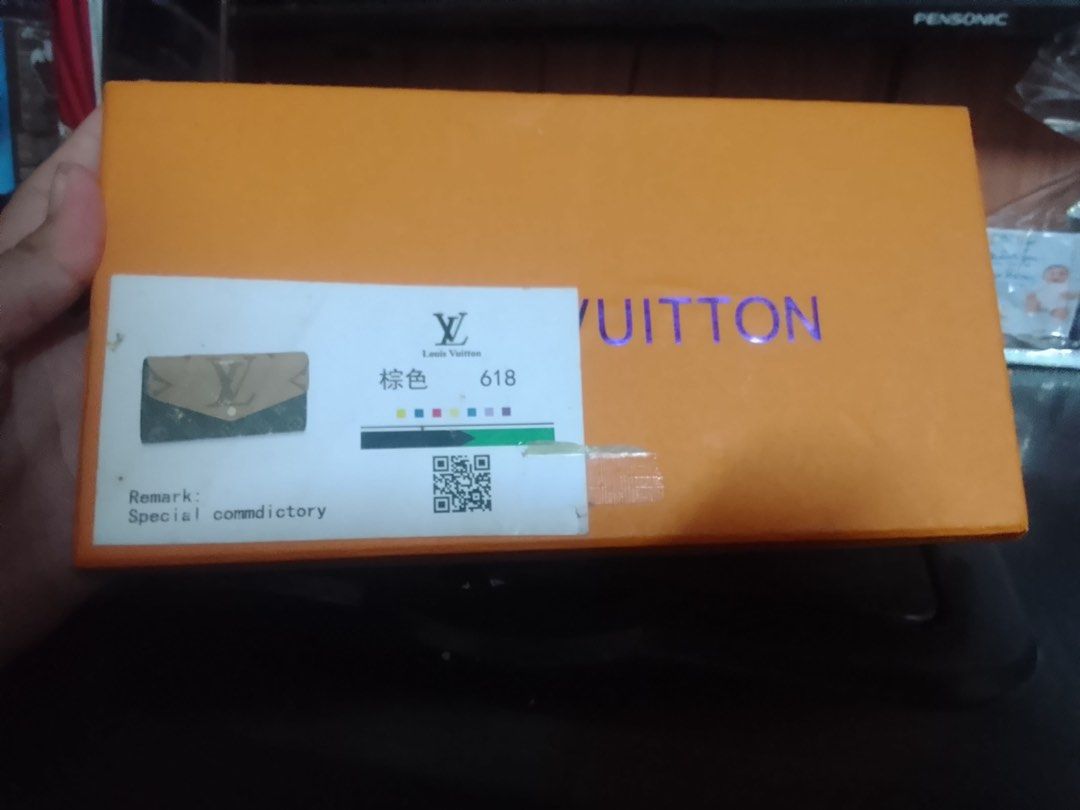 Louis Vuitton Monogram Envelope Wallet with Box and Dust Bag (Category: Luxury Bags & Wallets) located in Caloocan City. Submitted by arkleii2112 (Listing ID 1468836444, Image 2). Description: - Authentic Louis Vuitton long envelope wallet - Classic brown monogram canvas with a chic lighter flap top - Secure front snap button closure - Spacious and clean interior layout for cards and cash - Includes matching dust bag - Comes with original branded