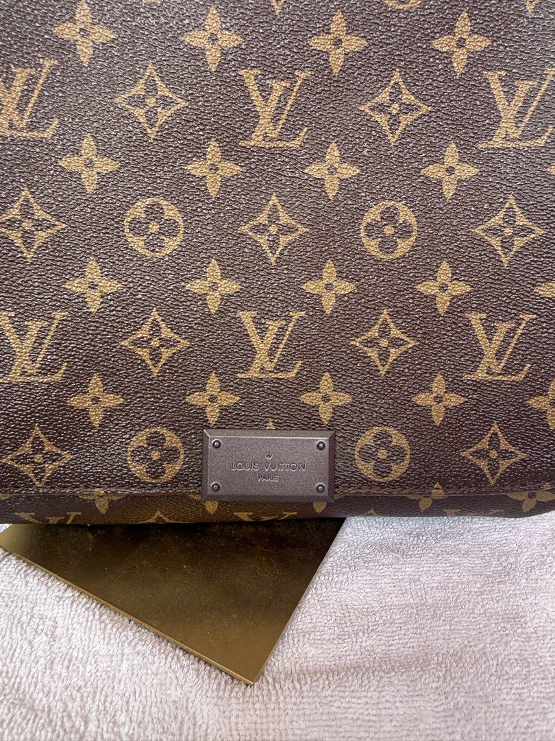 Louis Vuitton Monogram Messenger Bag (Category: Luxury Bags & Wallets) located in Consolacion. Submitted by naome1. (Listing ID 1468880928, Image 2). Description: - Authentic quality Louis Vuitton Monogram canvas crossbody bag - Dark brown adjustable strap for comfortable wear - Iconic Louis Vuitton Paris metal plaque on the front flap - Clean leather side tabs with brand logo and location stamps - Spacious and sturdy interior, perfect as an ever