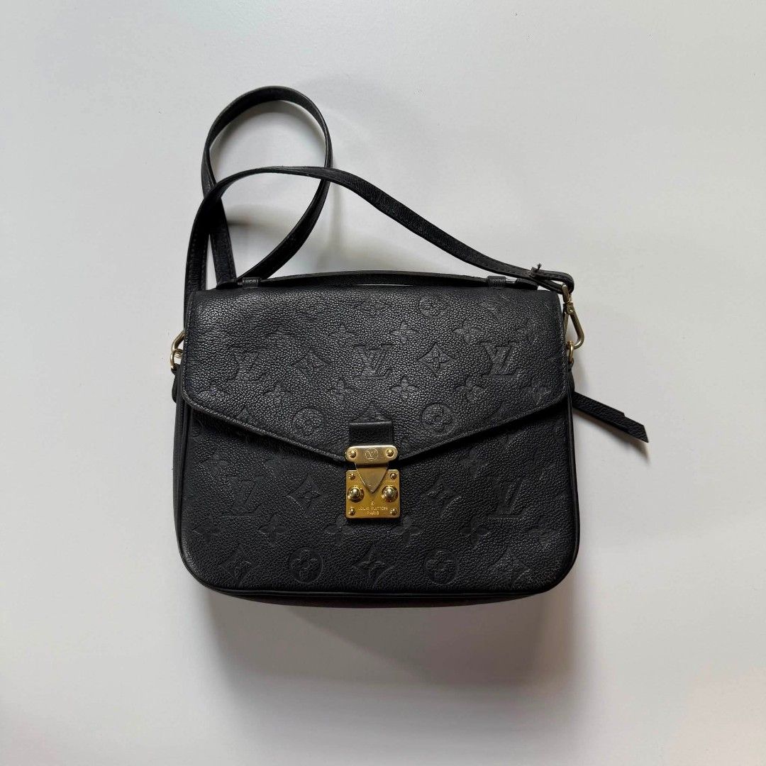 Louis Vuitton pochette metiz MM (Category: Luxury Bags & Wallets) located in Bacolod. Submitted by lux.antithrifts (Listing ID 1468767616, Image 1). Description: Brand: Louis Vuitton Model: Pochette Métis MM Material: Supple Monogram Empreinte embossed grained cowhide leather Color: Noir (Black) with gold-color hardware Dimensions: Approximately 25 x 19 x 7 cm (Length x Height x Width) Key Design Features Silhouette: A modern, compact take on the