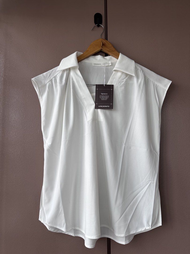 Love Bonito white top (Category: Sleeveless) located in Abucay. Submitted by closetofaca (Listing ID 1468798798, Image 1). Description: Small on tag but sizing runs big Bust: 42”.