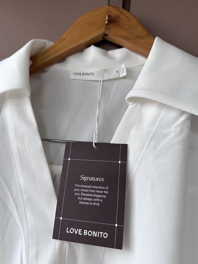 Love Bonito white top (Category: Sleeveless) located in Abucay. Submitted by closetofaca (Listing ID 1468798798, Image 3). Description: Small on tag but sizing runs big Bust: 42”.