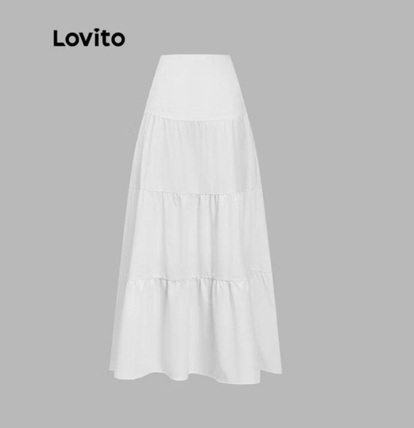 Lovito White Tiered Maxi Skirt (Category: Skirts) located in Quezon City. Submitted by cailyfinds (Listing ID 1468870185, Image 2). Description: - Brand/Style: Lovito tiered maxi skirt - Color: Solid white - Fit: High-waisted with multiple gathered layers - Length: Ankle-length with lightweight, flowy fabric - Versatility: Easy to pair with any crop top or basic tee - Vibe: Simple and casual -brandnew with tag.
