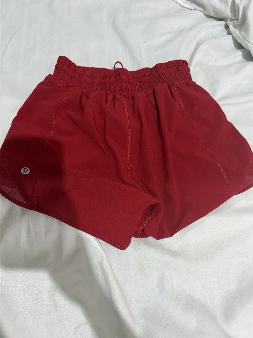 Lululemon Athletic Shorts Size 2 Red (Category: Shorts) located in Pasay City. Submitted by gold1001 (Listing ID 1468808311, Image 1). Description: - Brand: Lululemon - Color: Vibrant Red - Size: 2 - Material: Lightweight, breathable fabric ideal for runs and workouts - Features: Elastic waistband with drawstring loop and built-in liner - Details: Clean inner tag and clear logo on the leg hem - Condition: Excellent, ready to wear.
