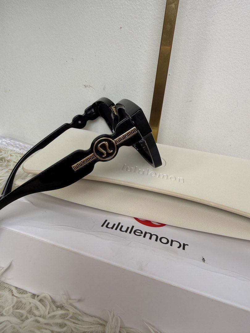 Lululemon Black Sunglasses with Case and Box (Category: Sunglasses & Eyewear) located in Consolacion. Submitted by naome1. (Listing ID 1468879873, Image 3). Description: - Brand: Lululemon - Model: 5805 (Size: 60-18-147) - Color: Classic black frame with elegant gold accents on the temples - Lenses: Dark tinted, square style - Origin: Made in Italy - Inclusions: Original cream-colored hard case and branded white storage box.