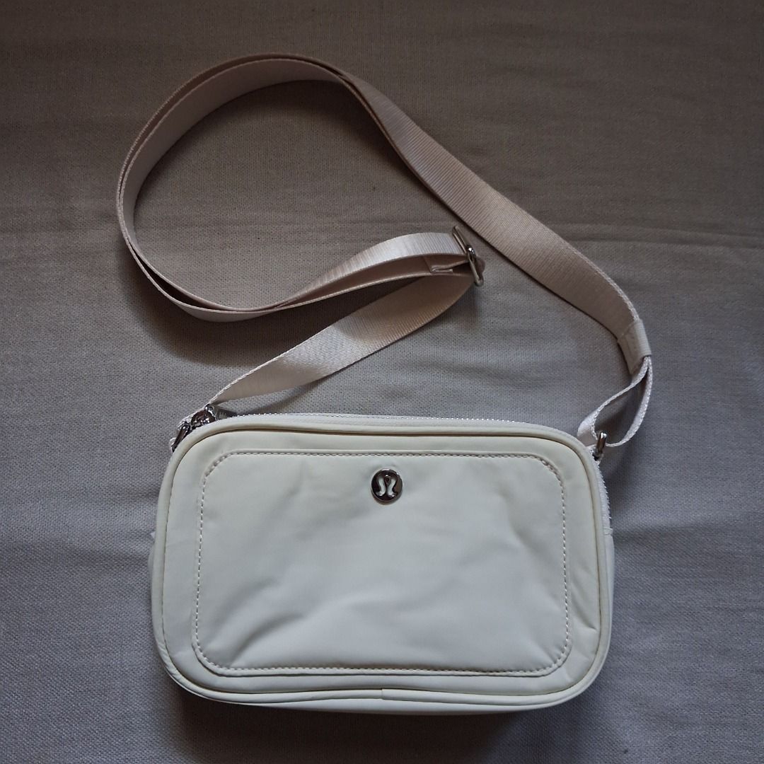 Lululemon Camera crossbody (Category: Cross-body Bags) located in Quezon City. Submitted by threeleggeddog (Listing ID 1468843314, Image 1). Description: pre-loved 9/10 condition light ivory color.