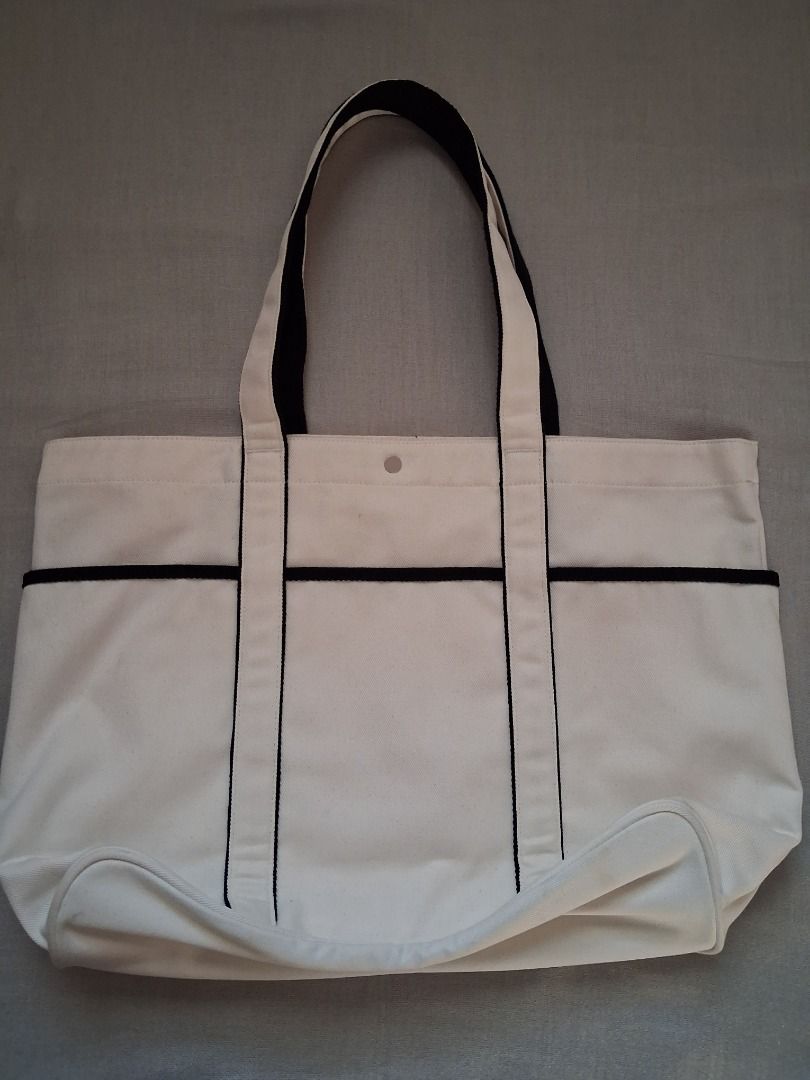 Lululemon Daily Multi-Pocket tote bag (Category: Tote Bags) located in Quezon City. Submitted by threeleggeddog (Listing ID 1468838623, Image 2). Description: pre-loved 9/10 condition white color.