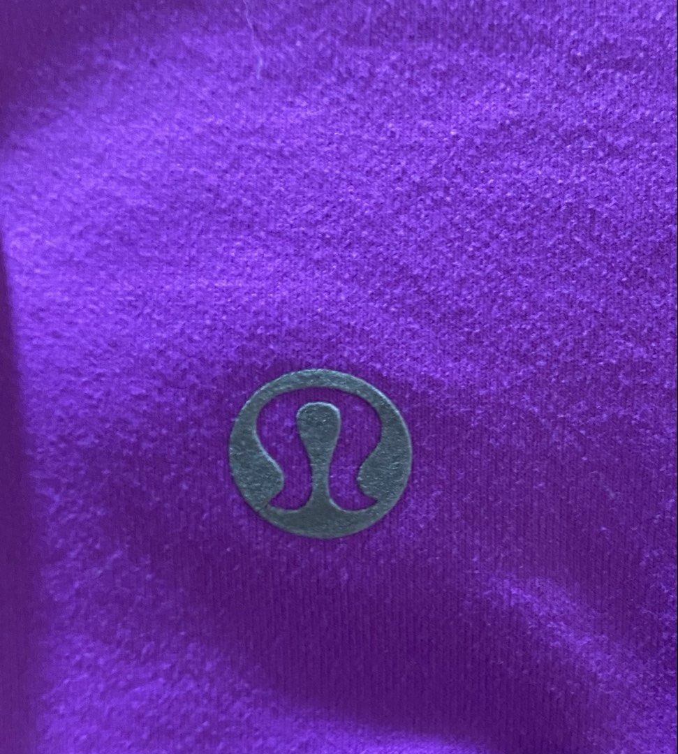 Lululemon Define Jacket Purple (Category: Coats, Jackets and Outerwear) located in Vinzons. Submitted by gabrielvic (Listing ID 1468740442, Image 3). Description: - Brand: Lululemon - Color: Bright purple - Fit: Fitted cut through the body with a stand collar - Closure & Pockets: Zip-up front with signature logo zipper pull and zipped front pockets - Comfort & Performance: Smooth performance fabric with long sleeves and thumbholes at cuffs - Extr