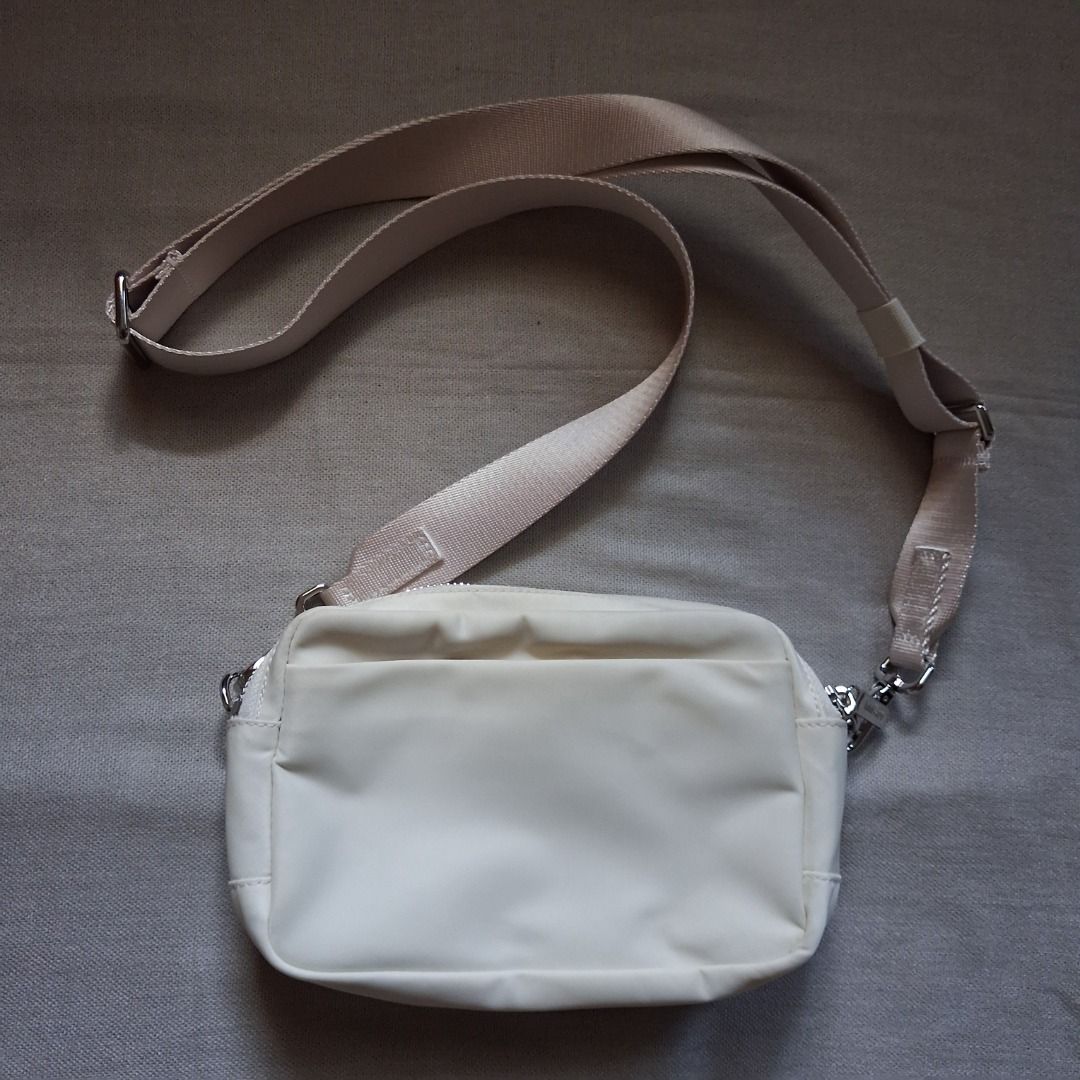 Lululemon Everywhere crossbody (Category: Cross-body Bags) located in Quezon City. Submitted by threeleggeddog (Listing ID 1468842396, Image 2). Description: brand new without tags light ivory color.