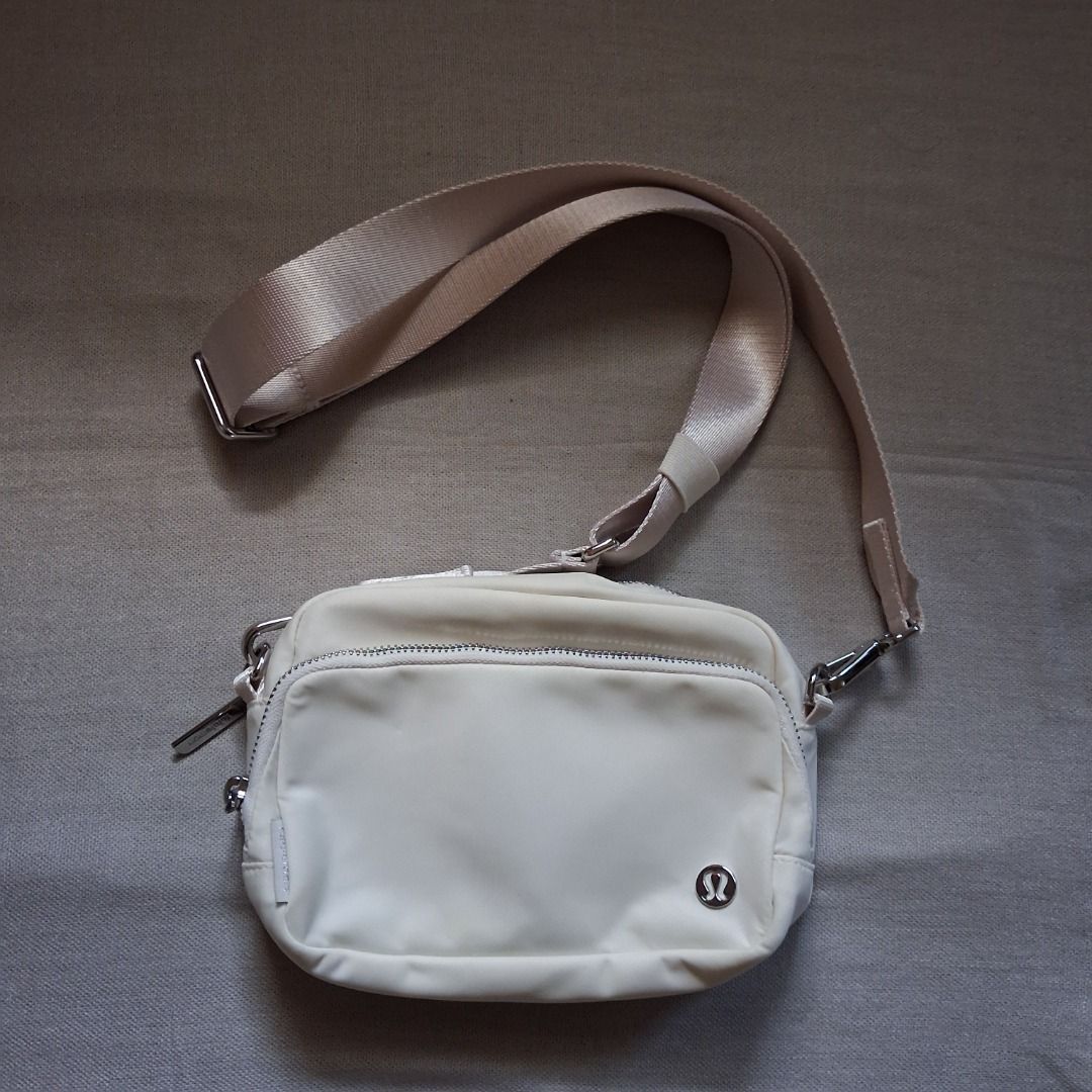 Lululemon Everywhere crossbody (Category: Cross-body Bags) located in Quezon City. Submitted by threeleggeddog (Listing ID 1468842396, Image 1). Description: brand new without tags light ivory color.