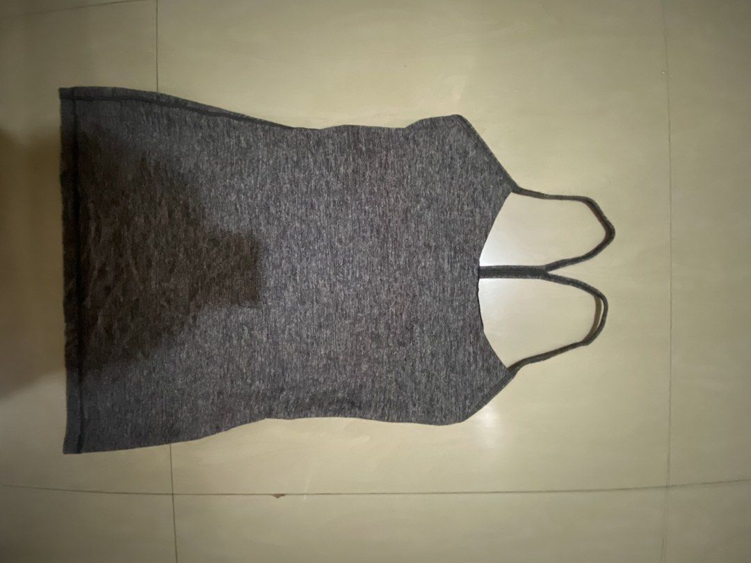 Lululemon Grey Workout Tank Top Size 9 (Category: Activewear) located in Vinzons. Submitted by gabrielvic (Listing ID 1468738171, Image 1). Description: - Authentic Lululemon athletic tank top in versatile grey - Size 9 (tag attached) - Features a built-in shelf bra for extra support - Chic and breathable strappy racerback design with classic back logo - Ultra-soft, stretchy fabric ideal for gym workouts, yoga, or casual OOTDs - Condition: Excell