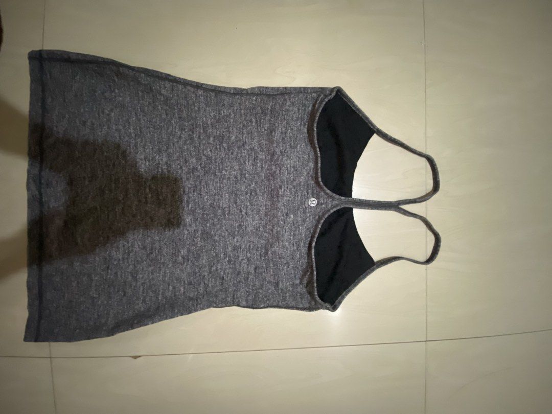 Lululemon Grey Workout Tank Top Size 9 (Category: Activewear) located in Vinzons. Submitted by gabrielvic (Listing ID 1468738171, Image 2). Description: - Authentic Lululemon athletic tank top in versatile grey - Size 9 (tag attached) - Features a built-in shelf bra for extra support - Chic and breathable strappy racerback design with classic back logo - Ultra-soft, stretchy fabric ideal for gym workouts, yoga, or casual OOTDs - Condition: Excell