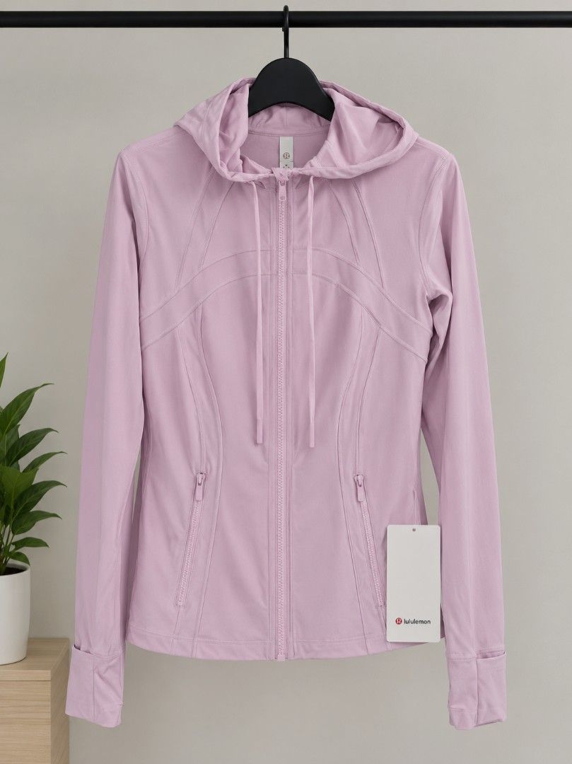 Lululemon hooded define jacket (Category: Activewear) located in Alcantara. Submitted by 2jongthebestseller (Listing ID 1468777784, Image 1). Description: Lululemon Hooded Define Jacket in a light pink shade made from buttery-soft Nulu fabric. bought it in US for $120. decluttering.