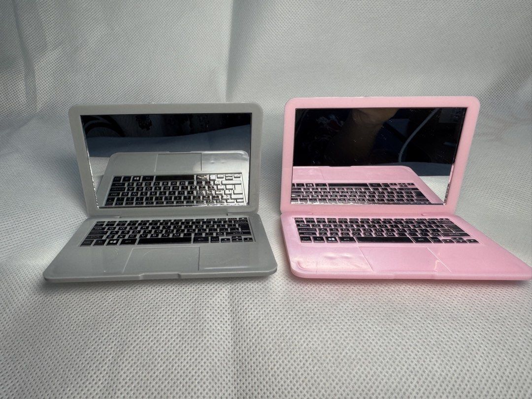 Macbook Mirror Compact (Category: Hair Accessories) located in Manila. Submitted by eyes.on.ally (Listing ID 1468778794, Image 2). Description: Mini mirror for your makeup bag Pink or Gray Macbook with keyboard .