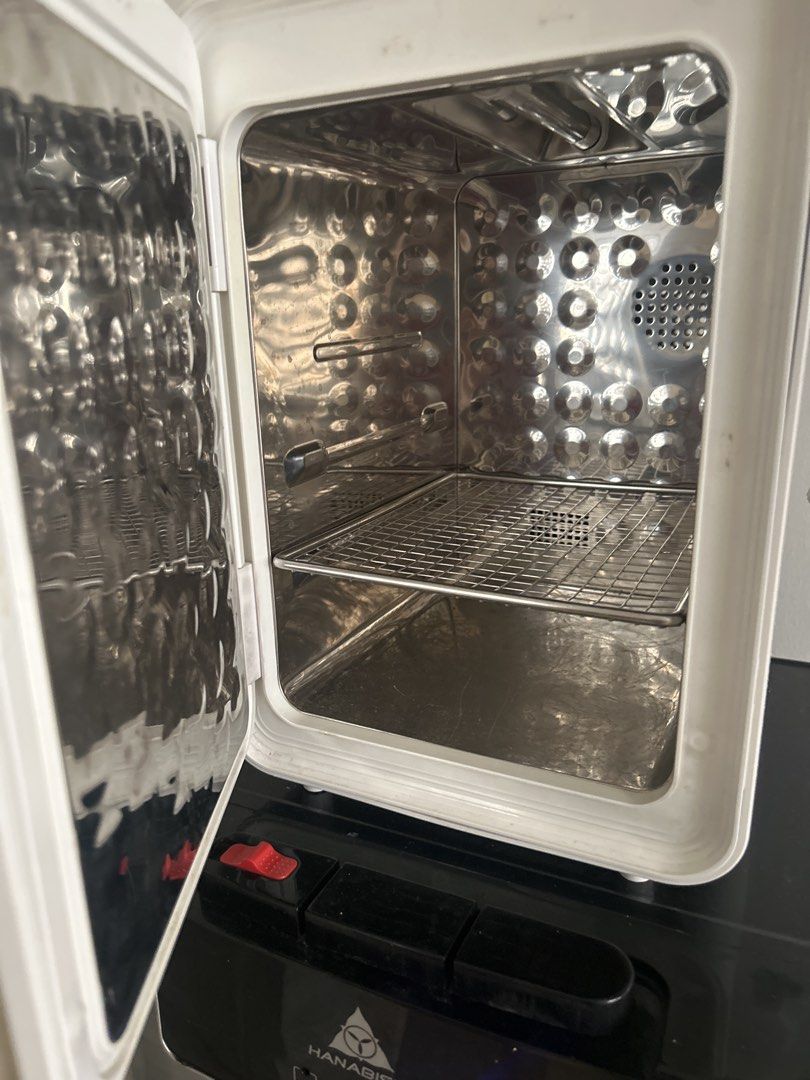 MafaBobe UV Sterilization Bottle Dryer HJ-E01 (Category: Breastfeeding & Bottle Feeding) located in Manila. Submitted by eeerk (Listing ID 1468752778, Image 3). Description: - Brand: MafaBobe - Model: HJ-E01 - Color: White with modern touch control panel on the door - Interior: Stainless steel chamber with a removable wire rack - Power: 220V / 125W (Standard PH plug) - Function: Sterilizer and dryer for baby bottles and accessories - Condition: E