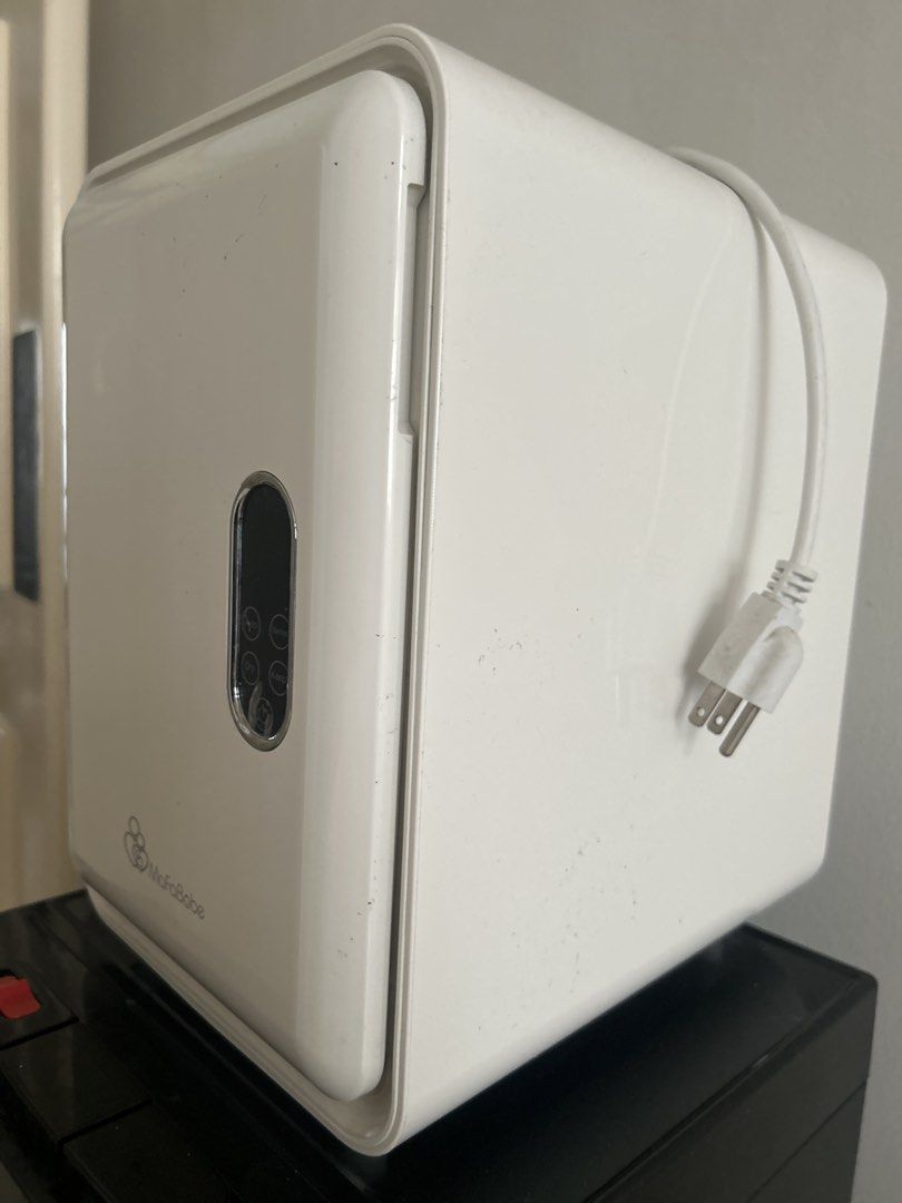 MafaBobe UV Sterilization Bottle Dryer HJ-E01 (Category: Breastfeeding & Bottle Feeding) located in Manila. Submitted by eeerk (Listing ID 1468752778, Image 2). Description: - Brand: MafaBobe - Model: HJ-E01 - Color: White with modern touch control panel on the door - Interior: Stainless steel chamber with a removable wire rack - Power: 220V / 125W (Standard PH plug) - Function: Sterilizer and dryer for baby bottles and accessories - Condition: E