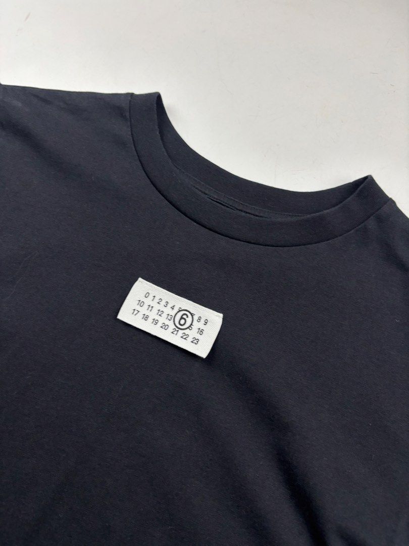 Maison Margiela Logo Patch Tshirt (Category: Shirts) located in Makati City. Submitted by ragrepository (Listing ID 1468729034, Image 2). Description: Maison Margiela Logo Patch Tshirt Tagged as Small Length- 22.5” Pit to pit- 17.5” Sleeves- 5.5” Shoulder-15” Condition-9/10 Flaw- None .